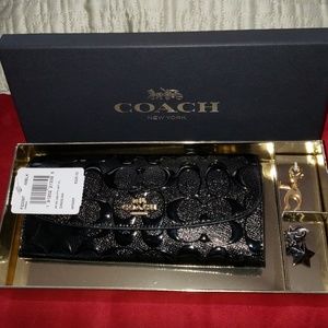 NWT COACH signature soft wallet with charms